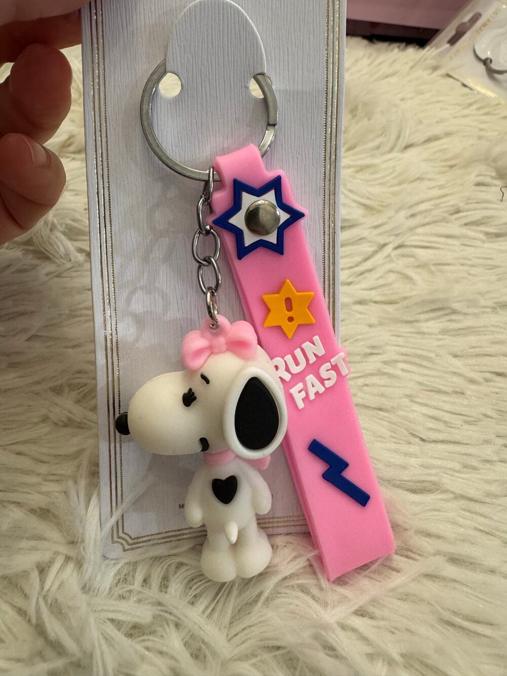 Snoopy sister Belle keychain with pink ribbon and pink strap
